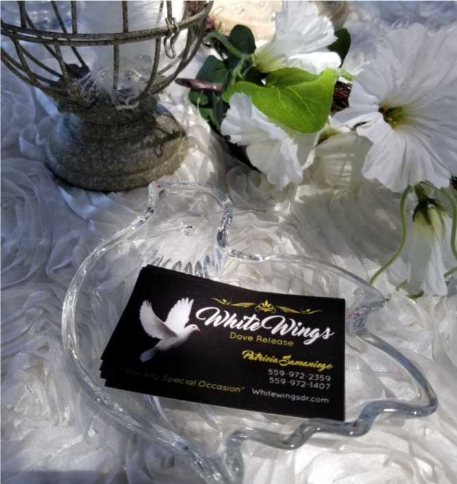 white wings dove release in fresno business card